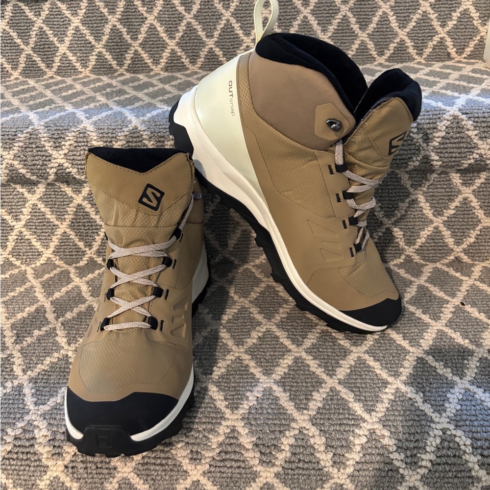 Black and tan Salomon hiking boots